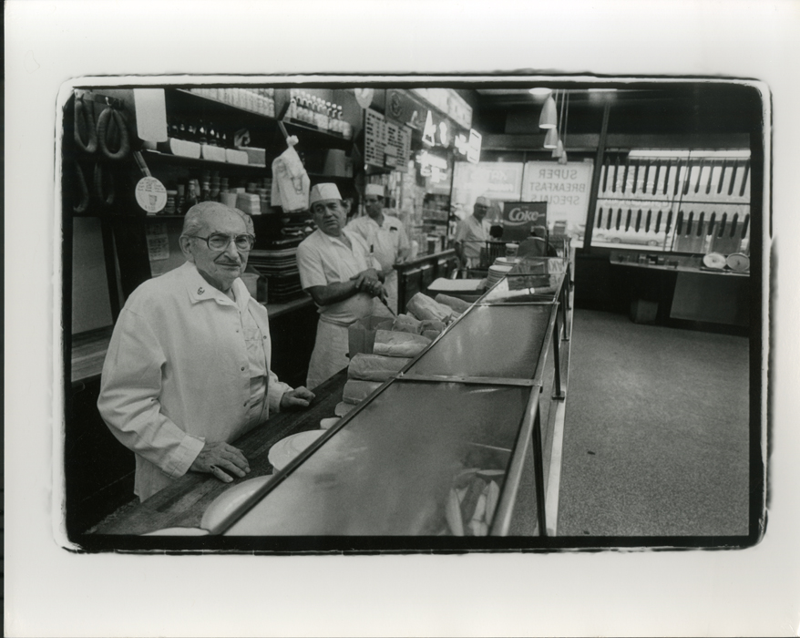 Employees of Katz’s Delicatessen behind the counter.