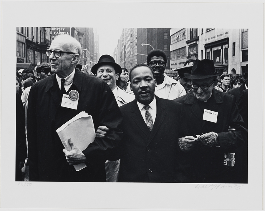Photograph of Dr. Martin Luther King, Jr., Dr. Benjamin Spock and Monsignor Rice of Pittsburgh at the Solidarity Day Parade in New York City on April 15, 1967. 