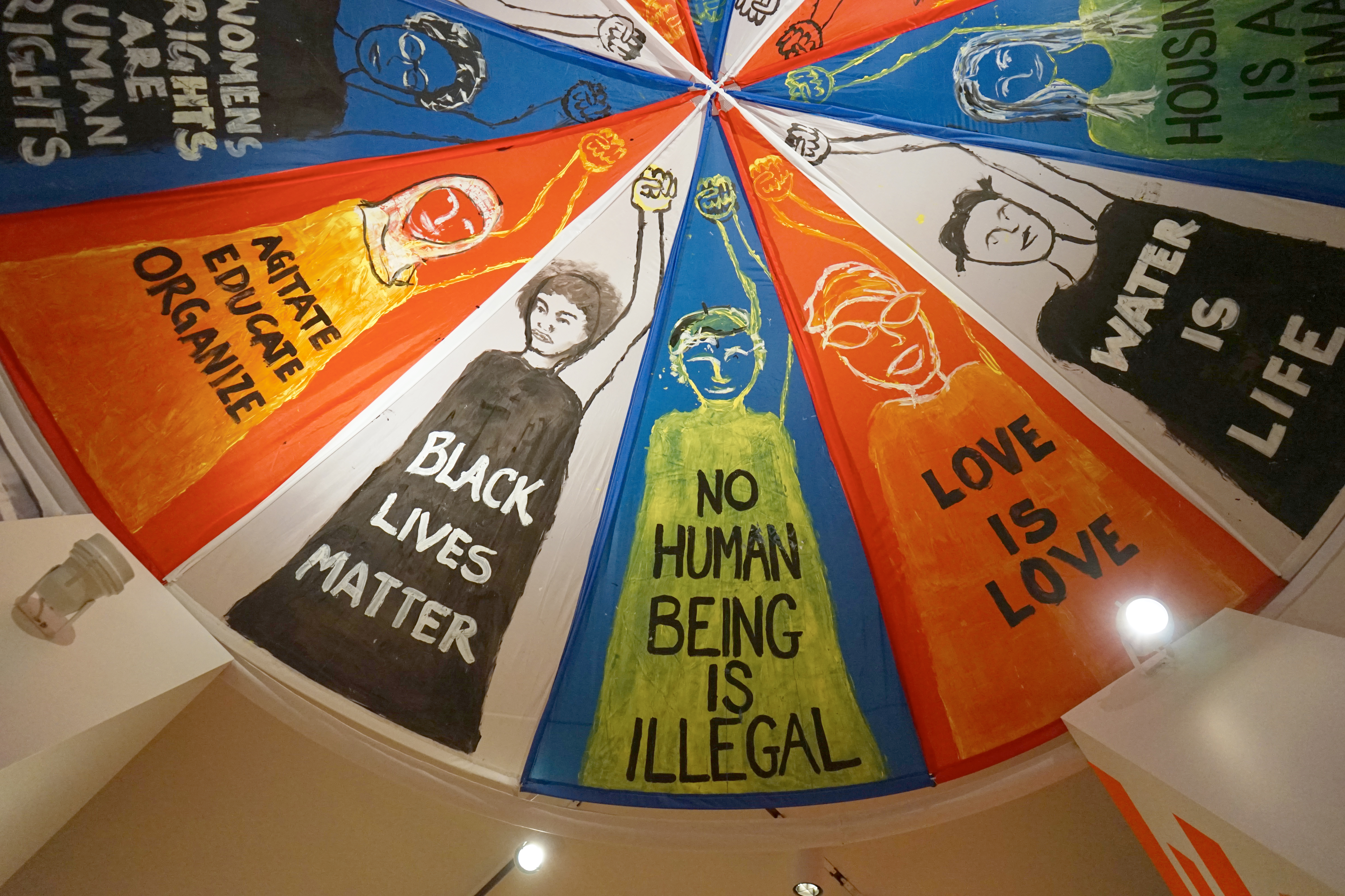 Parachute created for the New York City women’s march on January 21, 2017, featuring a diverse range of 12 women activists, artists, and politicians.