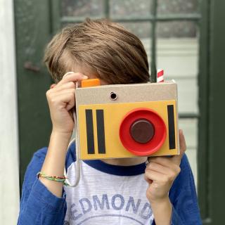 boy with a cardboard camera