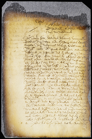A browned and aged documents with burn marks at the tops and edges of the papers with cursive script written in Dutch.