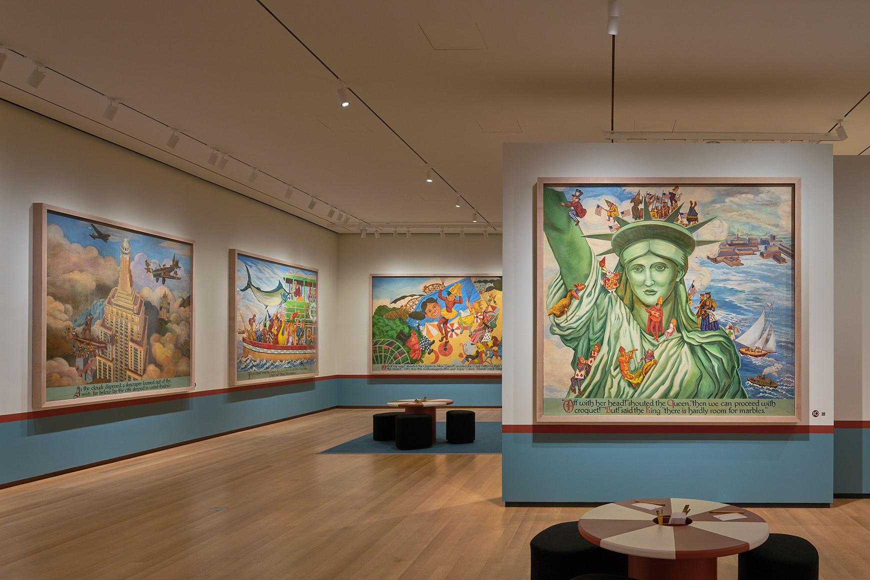 Large mural panels showing Alice and other characters exploring New York City, with red and white tables in the middle of the gallery.