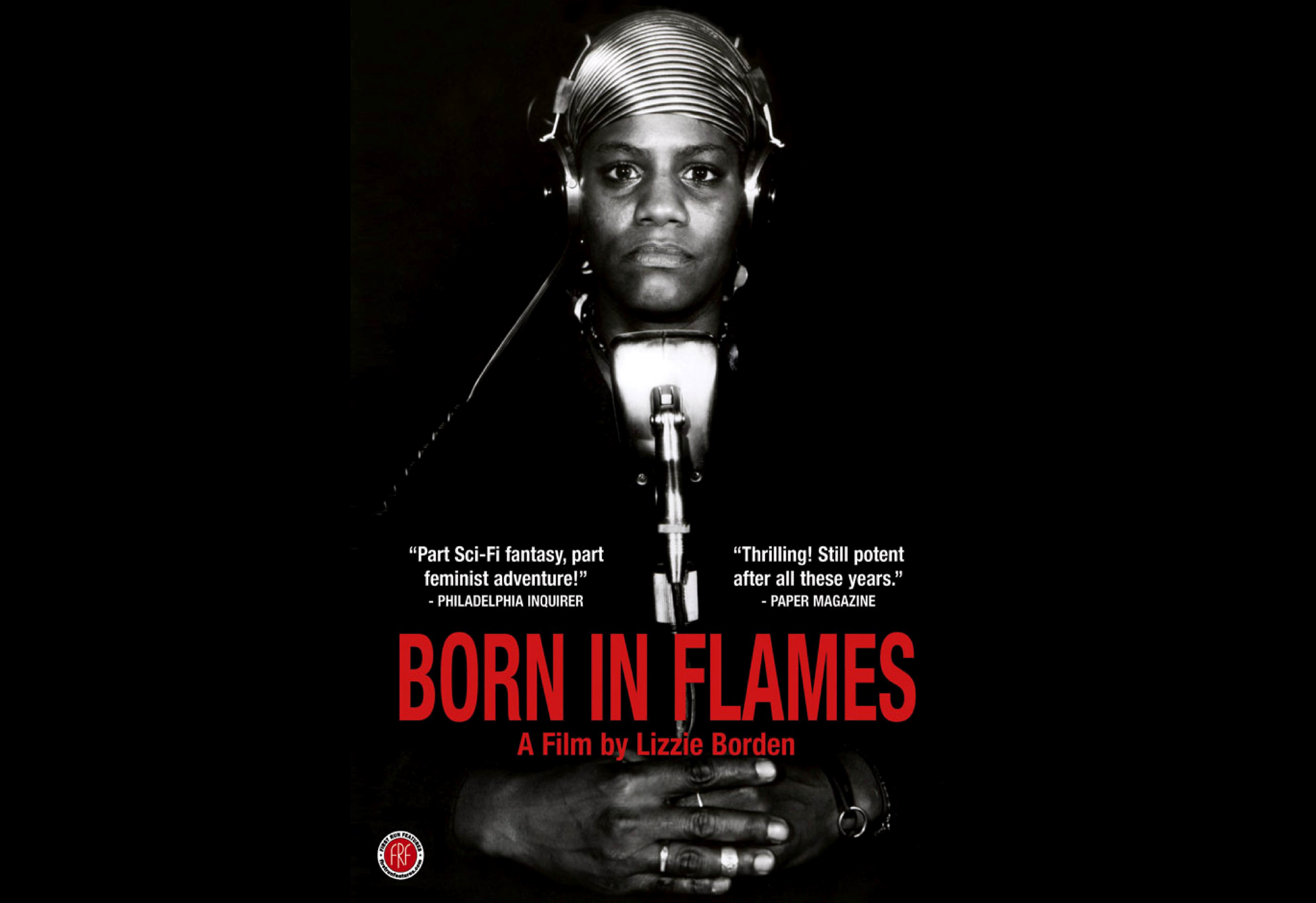 Affiche du film "Born in Flames". Une femme regarde la caméra avec les mains croisées.
