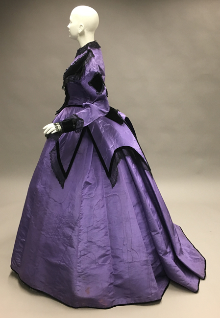 Side view of ca. 1866 dress. 41.35.105A-C.