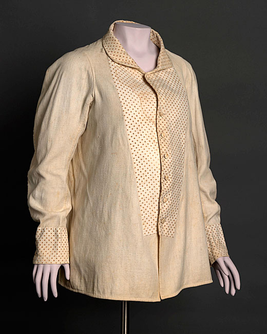 Maternity shirtwaist made of printed and quilted cotton applied to cotton twill.