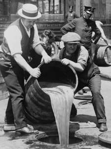 New York City Deputy Police Commissioner John A. Leach (right) Watching Agents Pour Liquor Into Sewer