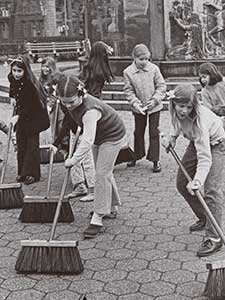 Girls Sweeping On Earth Day