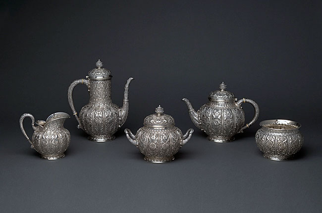 Photograph of a five-piece coffee and tea service by Tiffany and Company.
