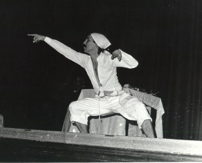 Black and white photo of Mario César Romero dancing