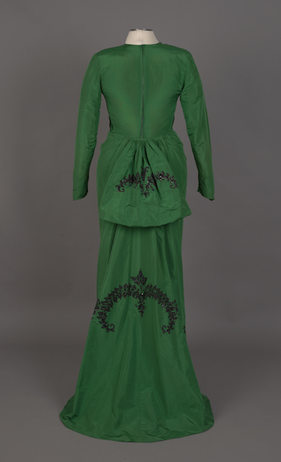 Concert gown in emerald green silk taffeta with black and jet embroidery.