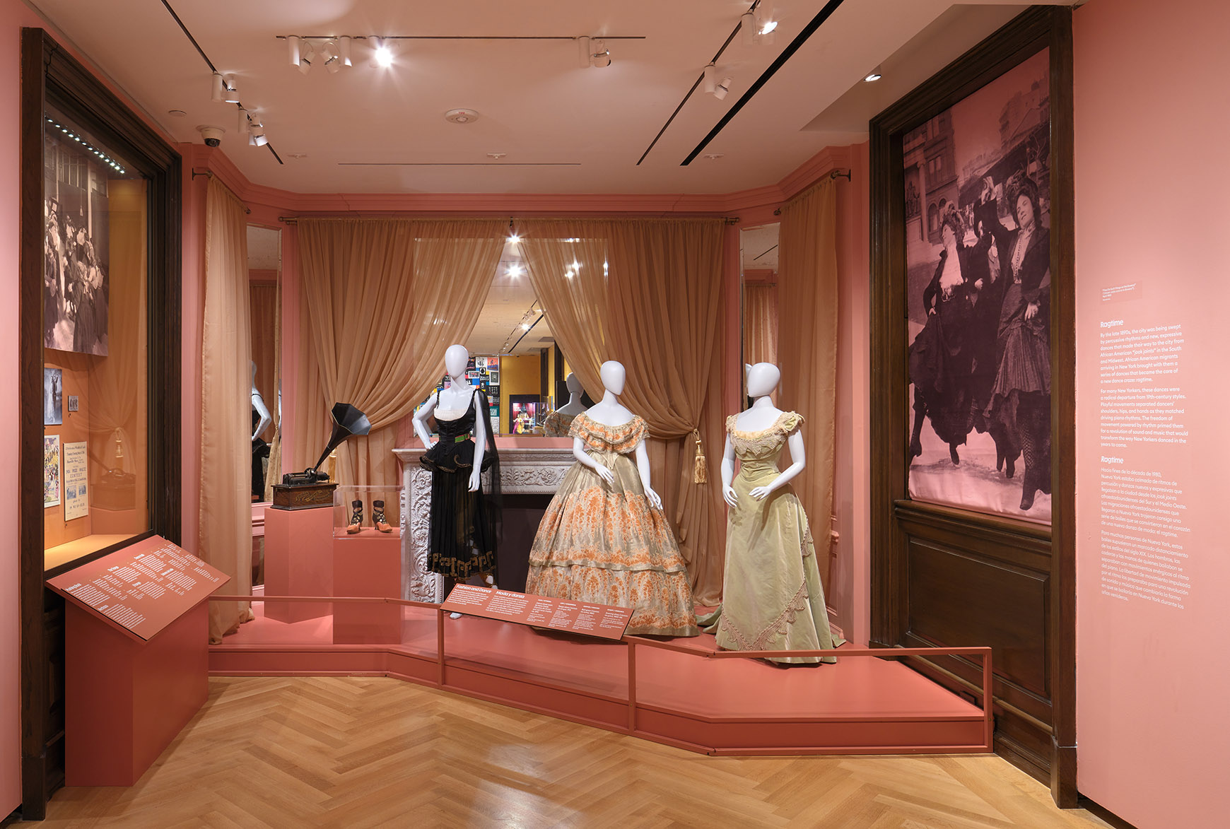 Installation of Urban Stomp with three mannequins in a room with pink walls