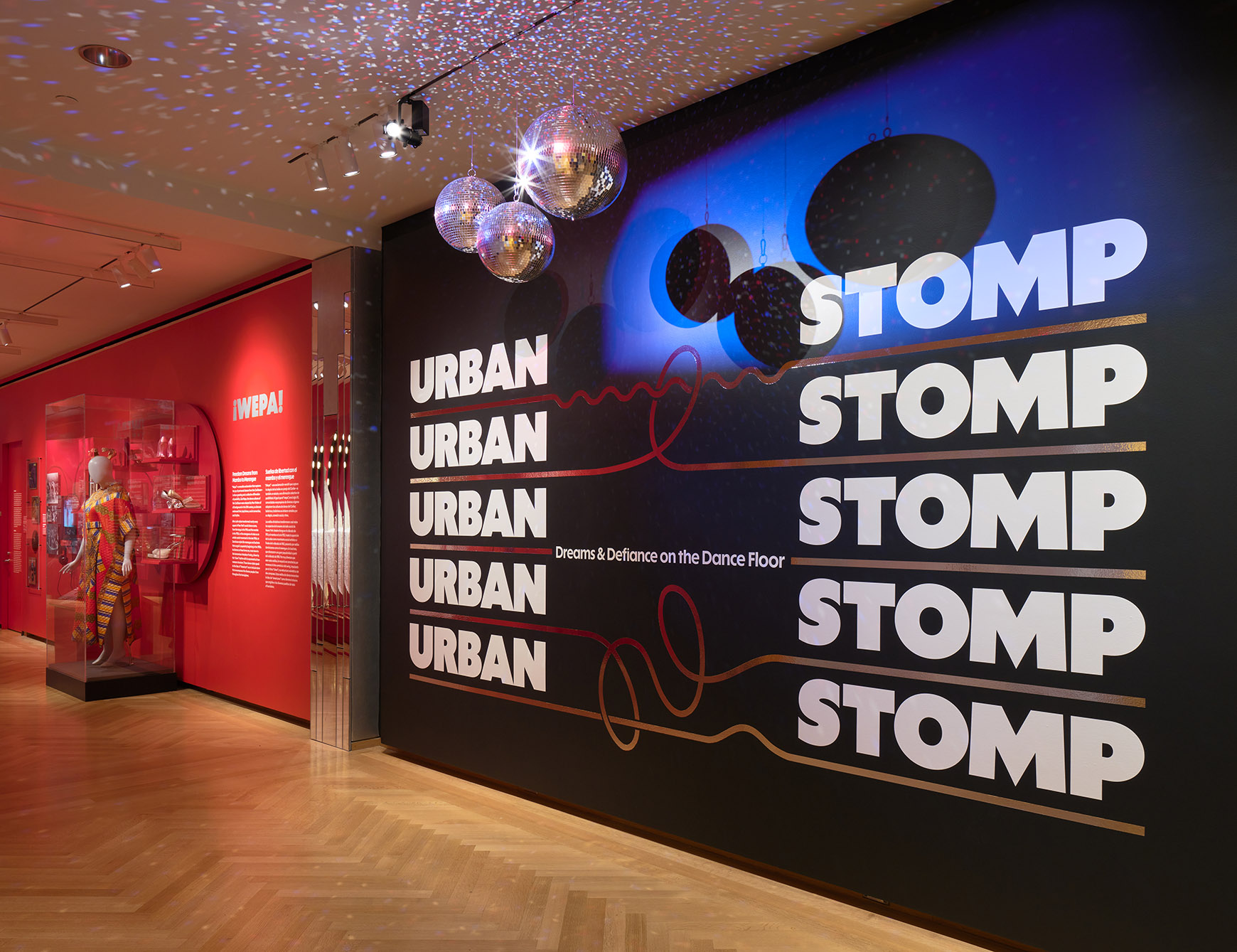 Installation of Urban Stomp, showing the exhibition title on a wall