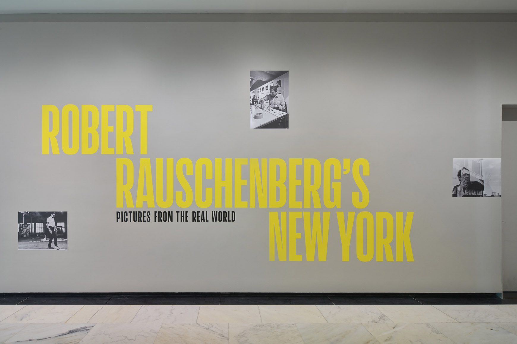 Installation of Robert Rauschenberg’s New York showing the exhibition title on a wall