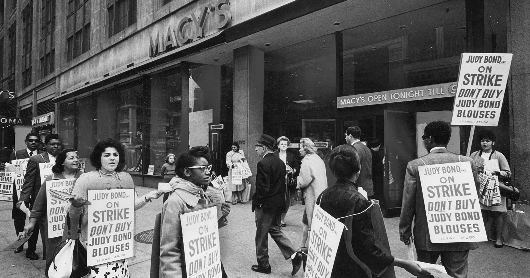 Picketing ILGWU members outside Macy's department store urge shoppers not to buy Judy Bond blouses