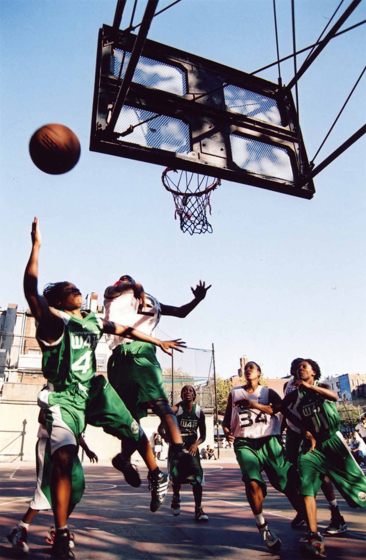 This photograph by Bobbito Garcia shows Bianca Brown #4 and Monique Coker #34 playing a tournament at West 4th Street circa 2003. 