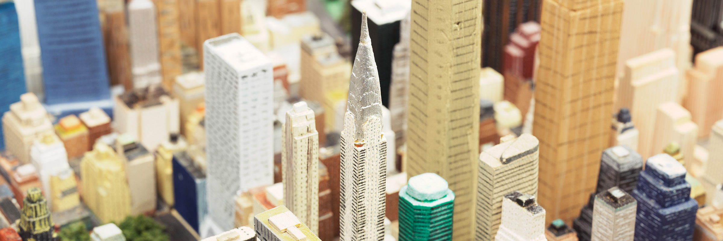 Miniature buildings from New York City carved out of wood