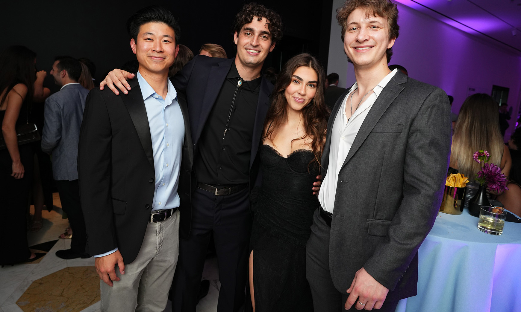 Four people posing for a photo at the 2025 Director's Circle Benefit