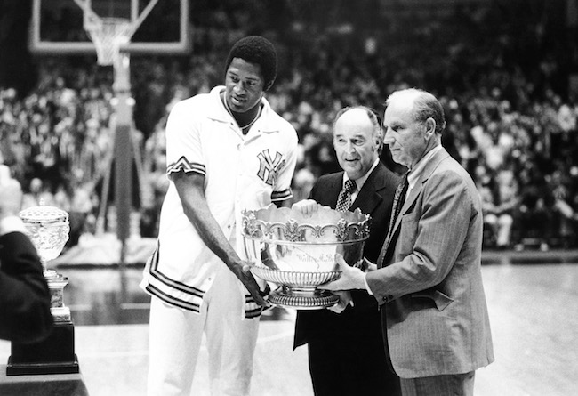 NBA Commissioner J. Walter Kennedy presents the Walter Brown Memorial Trophy to Willis Reed and Red Holzman