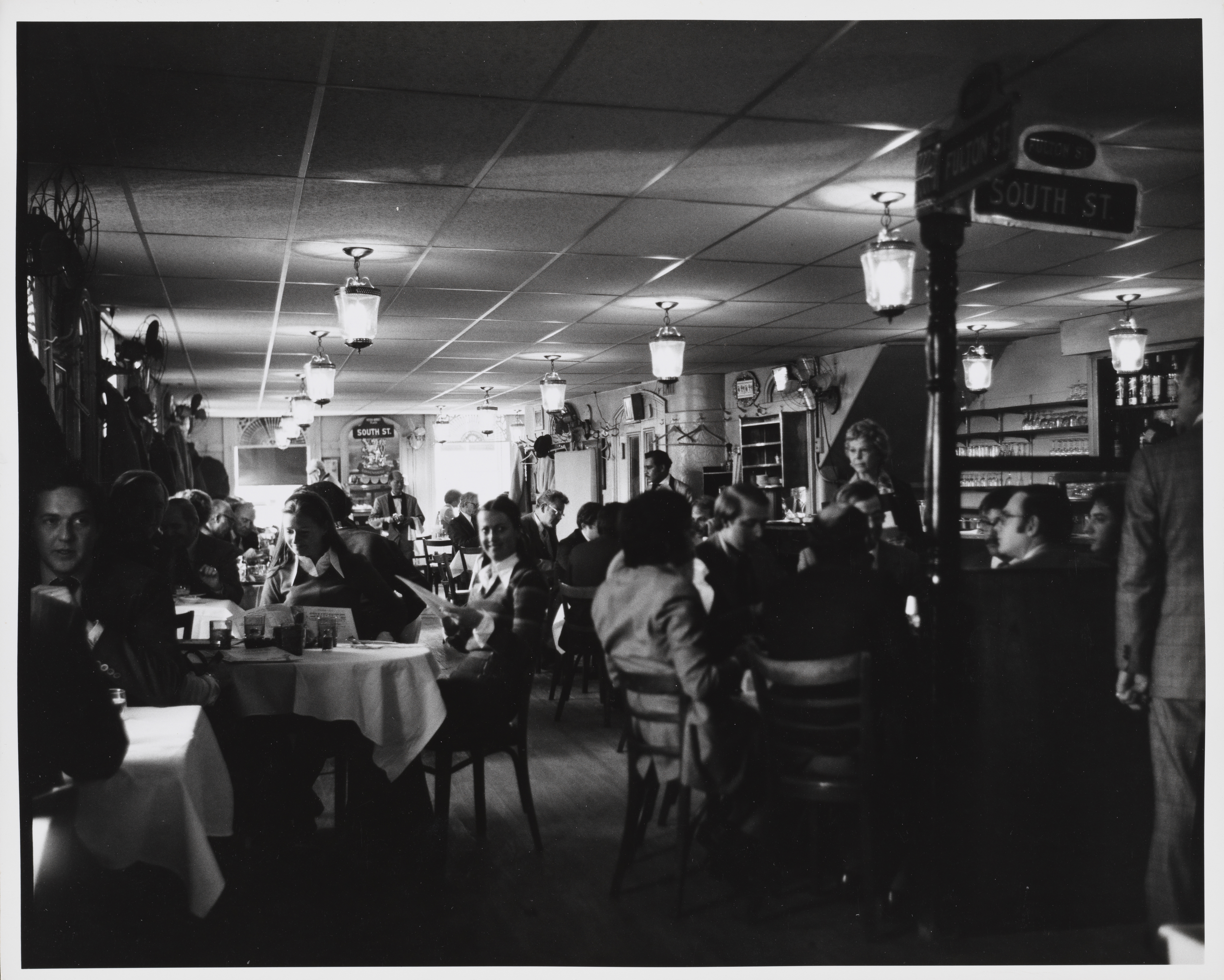 Edmund Vincent Gillon. [Interior of Sweet’s Restaurant, 2 Fulton Street.] ca. 1977. Museum of the City of New York. 2013.3.1.315