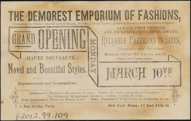 Text, in black, on the verso of a card advertises the Demorest Emporium of Fashions