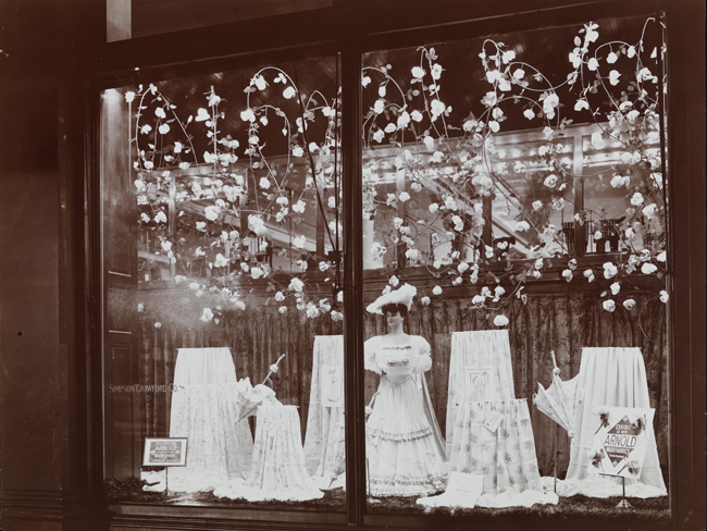 Window displays of Simpson Crawford Co. department store featuring Arnold Wash fabrics.