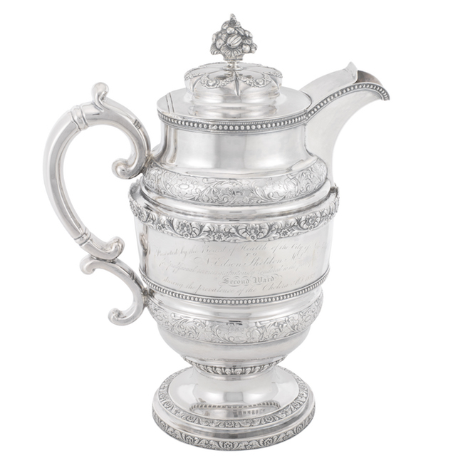 Covered silver ewer with inscription.