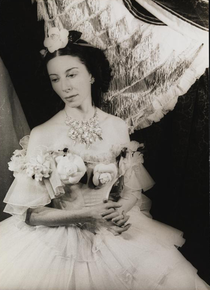 A portrait of a ballerina in costume.