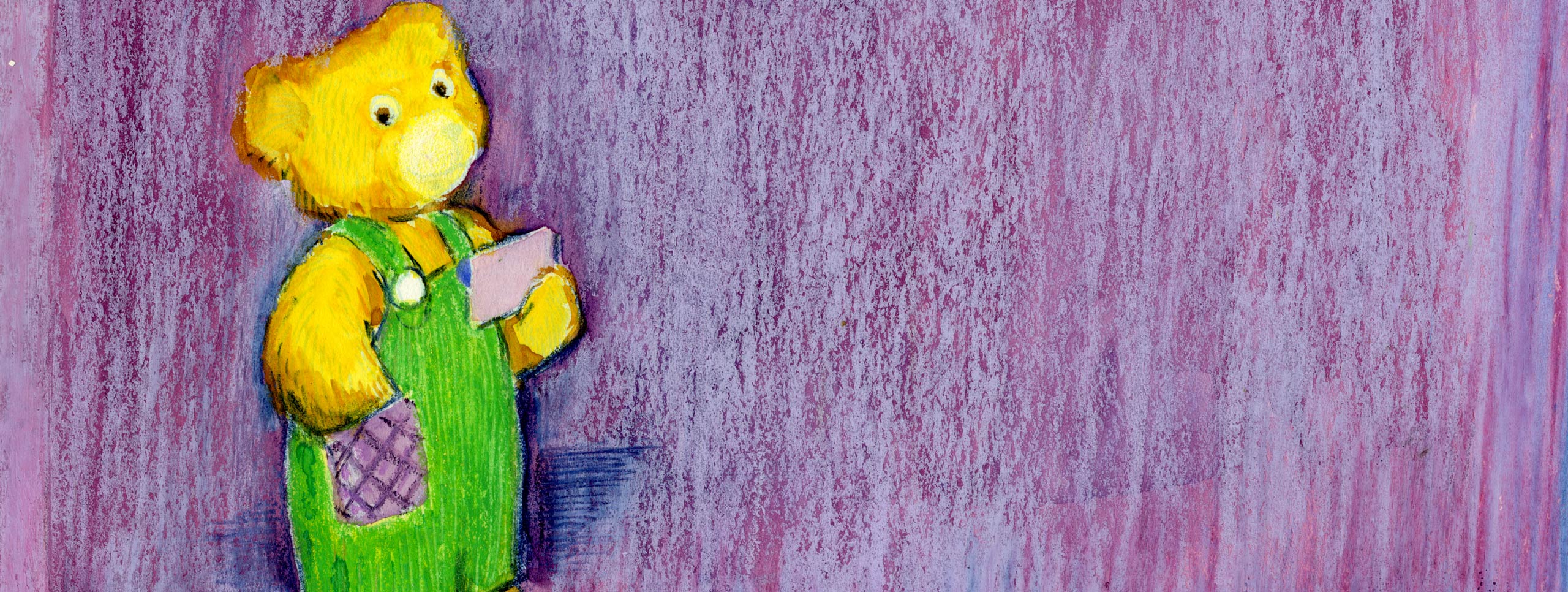teddy bear with green overalls