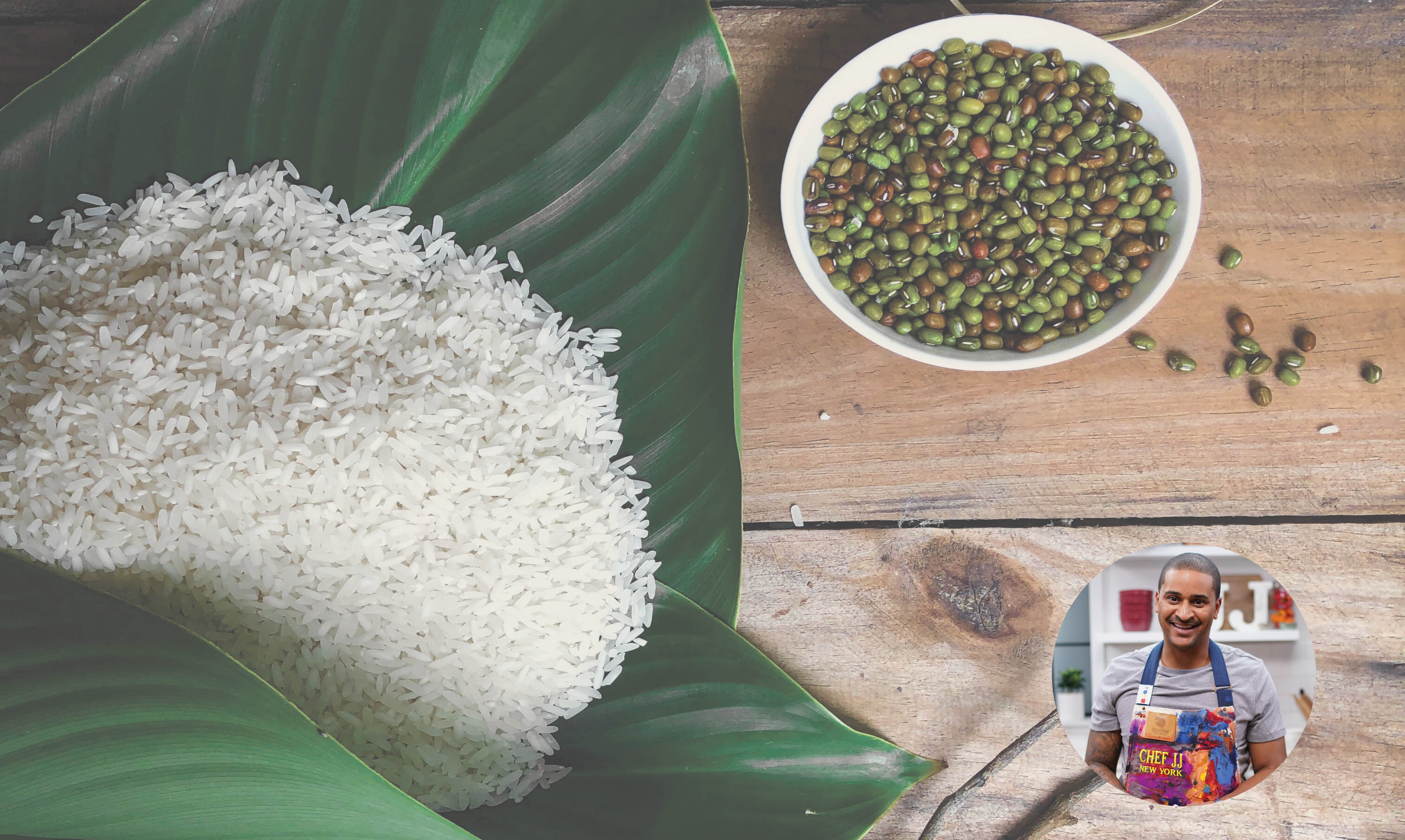 A pile of uncooked white rice on top of a green leaf. To the right is a bowl of uncooked beans. On the lower right corner is a headshot of Chef JJ Johnson.
