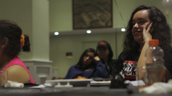 Angy Rivera, right, of the New York State Youth Leadership Council, at an open-mic night for undocumented and other immigrant youth,