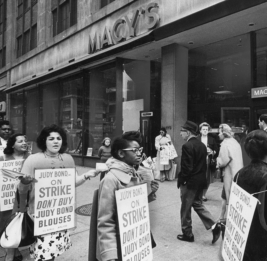 Picketing ILGWU members outside Macy's department store urge shoppers not to buy Judy Bond blouses