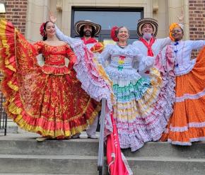 Dancers in traditional Cumbia regalia