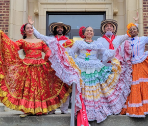 Traditional cumbia dancers posing 
