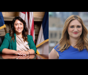 Two women in separate portraits: the woman on the left is seated at a desk with U.S. flags in the background, wearing a green blazer and light blouse; the woman on the right is standing outdoors with a cityscape backdrop, wearing a royal blue dress and smiling