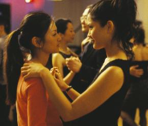 Michelle Krusiec and Lynn Chen slow dance, staring into each others' eyes.