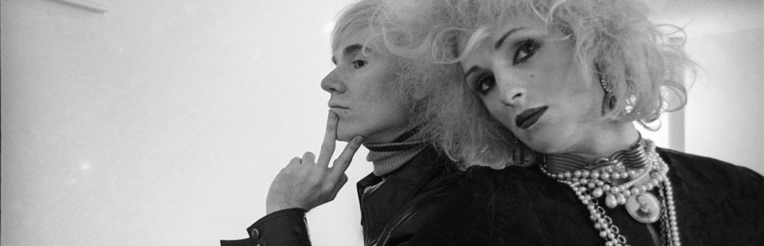 Black and white photograph of Andy Warhol and Candy Darling