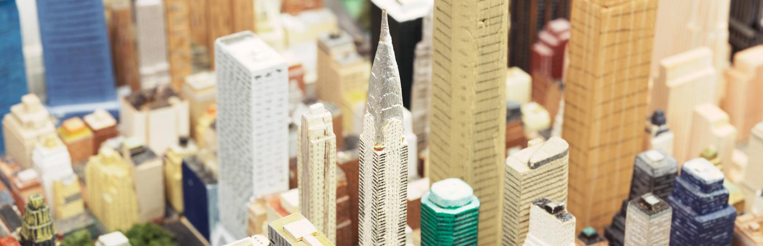 Miniature buildings from New York City carved out of wood