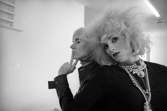 Black and white photograph of Andy Warhol and Candy Darling