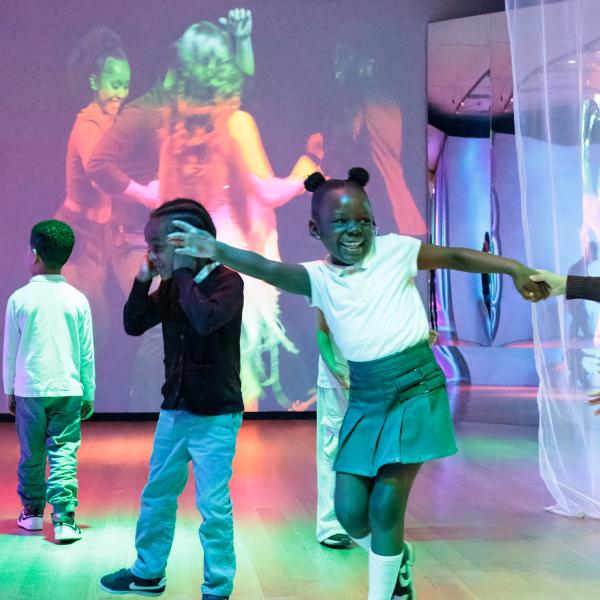 Children dancing in the Museum of the City of New York 