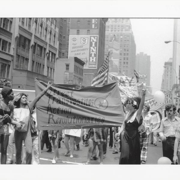 Members of the Street Transvestites Action Revolutionaries hold the group’s banner aloft as they join in the 1973 Christopher Street Liberation Day March. 