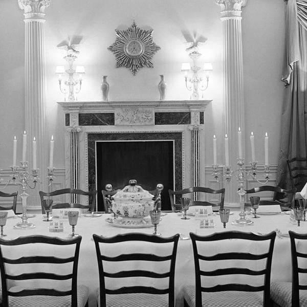 Extravagantly furnished dining room at 960 Fifth Avenue. The setting includes a central table with elaborate place settings.
