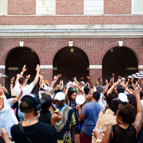 People dancing outside of the Museum of the City of New York 