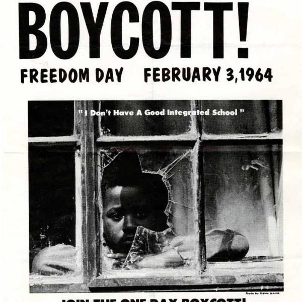 Image shows a flyer for the New York City school boycott on February 3, 1964. The flyer features a photo of a Black boy staring out a broken school window. Under the photo is a quotation: “I don’t have a good integrated school.”