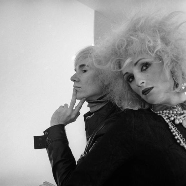 Black and white photograph of Andy Warhol and Candy Darling