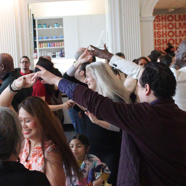 People dancing in a museum