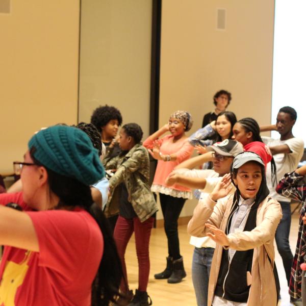 People following a dance instruction