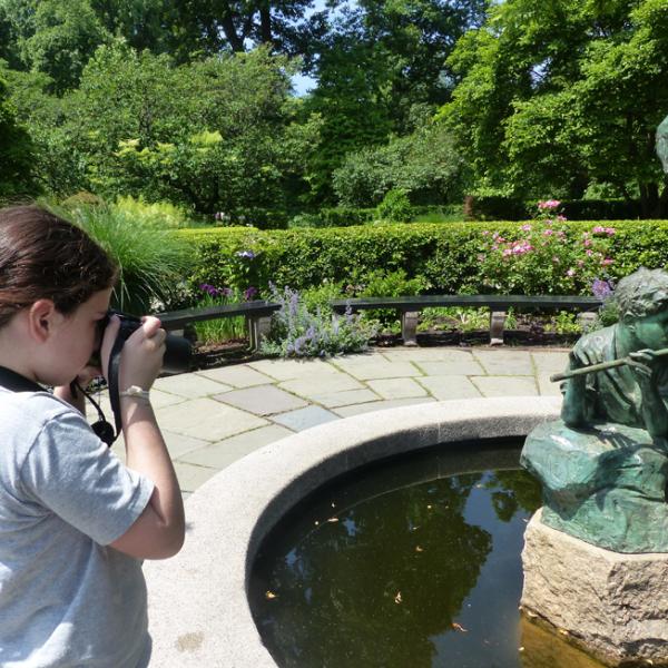 June camper photographing in the Conservatory Garden. Central Park, 2016.