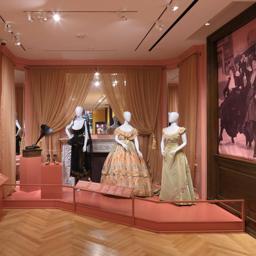 Installation of Urban Stomp with three mannequins in a room with pink walls