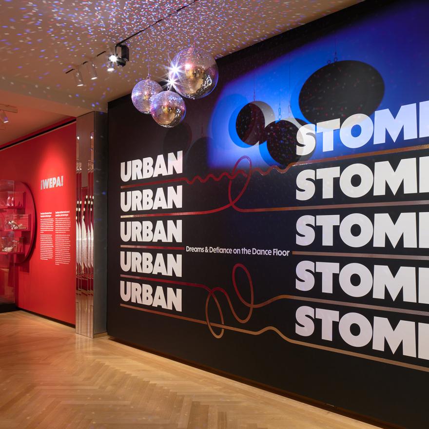 Installation of Urban Stomp, showing the exhibition title on a wall
