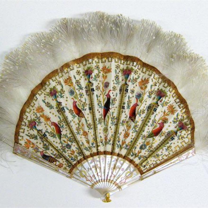 Fan made of white sticks, with detailed birds and flowers painted on the fabric between the ribs, and feathers on the top